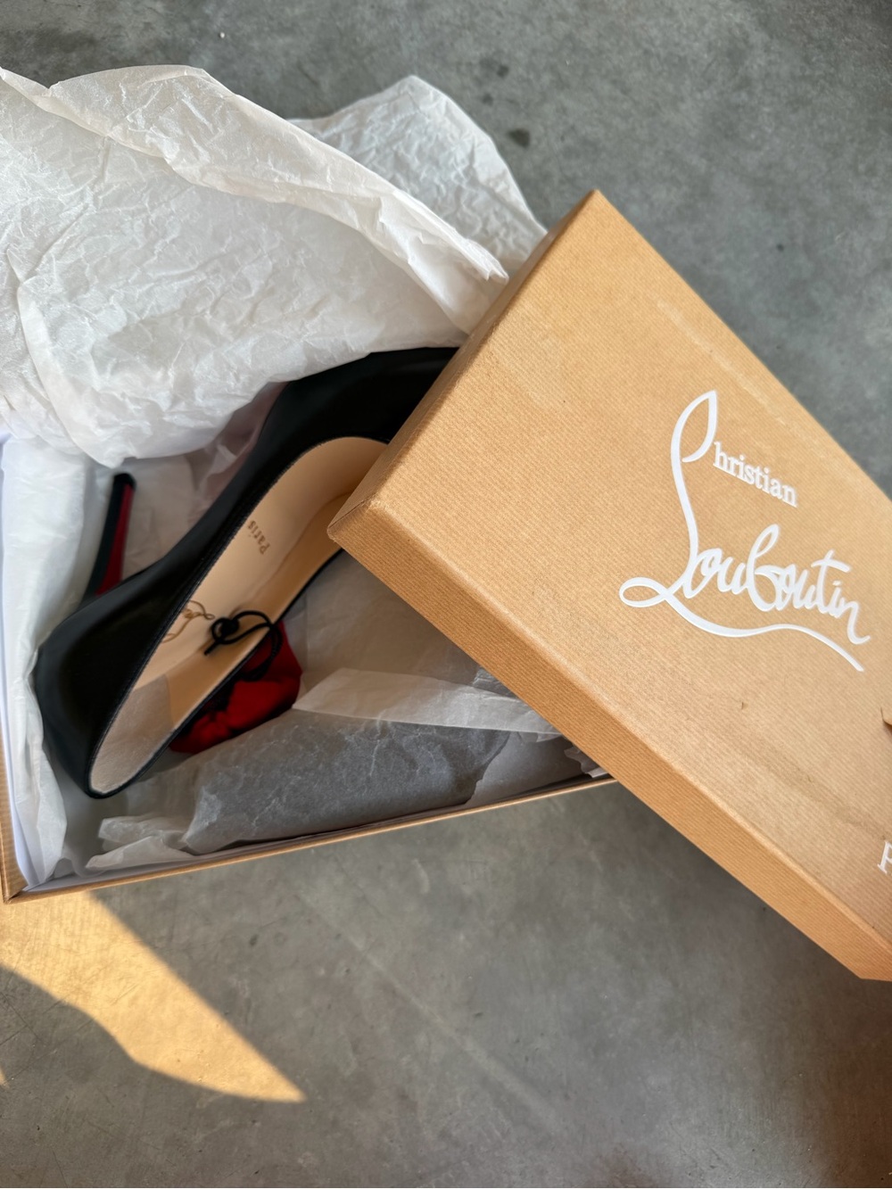 Christian Louboutin Black Leather Pumps with Red Sole